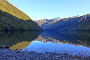 Lake Christabel West Coast Lake Reflection Of Mountains