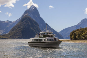 Milford Track Guided Walk Boat Cruise Boat In River
