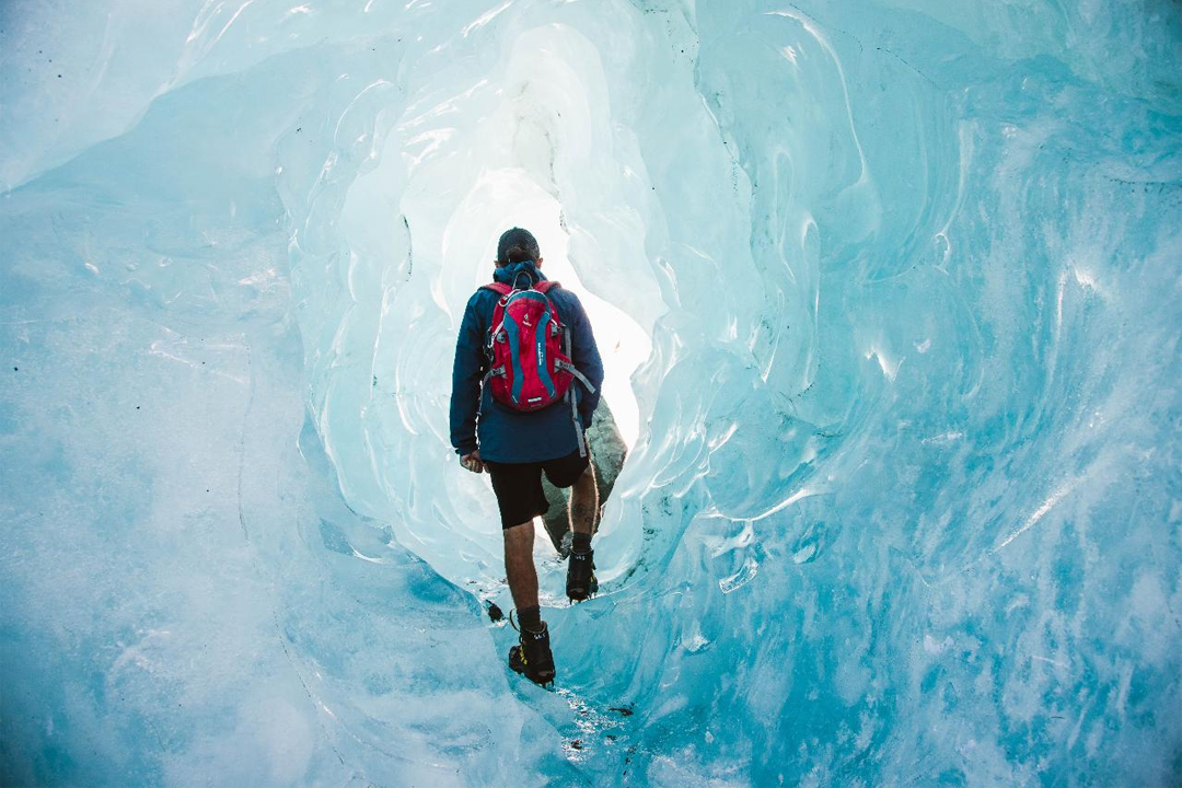 Mt Cook Scenic Tour Man Walks In Glacier