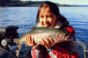 One Scenic Cruise To The Ngatoroirangi Maori Rock Carvings With Fisihing Girl With Fish