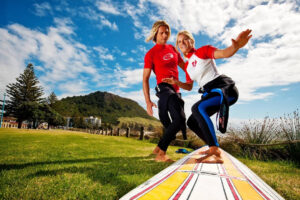 Aloha Group Lesson Instructor Teaches Surfing