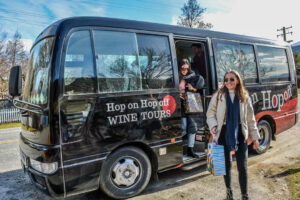 Bannockburn Hop On Hop Off Wine And Beer Tour People Exit Bus