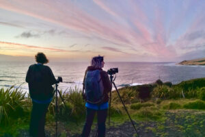 Northern Coast New Zealand Photography Tour People Wait Near Cliff For Perfect Photo