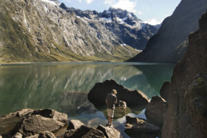 Private Lake Marian Guided Walk Hiker Marvels And Reflection In Lake