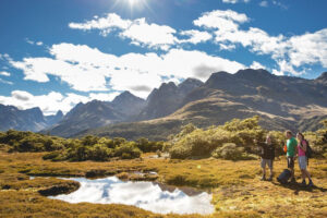 Private Routeburn Track Guided Walk Couple Listens To Guide